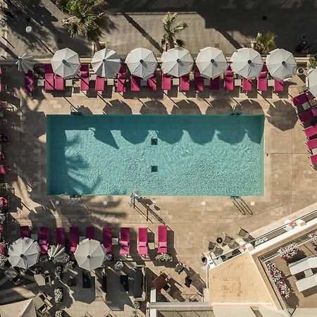 Pure Salt Garonda - Adults Only Hotel Плая де Палма Екстериор снимка Aerial view of the pool at the Beverly Hills Hotel